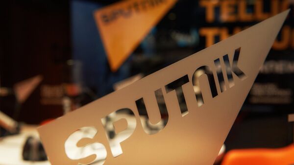 Логотип международного информационного бренда Sputnik - Sputnik Узбекистан