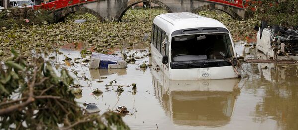 Последствия наводнения в Японии Последствия наводнения в Японии - Sputnik Узбекистан