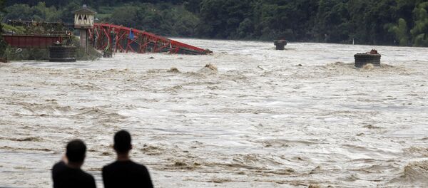 Последствия наводнения в Японии Последствия наводнения в Японии - Sputnik Ўзбекистон