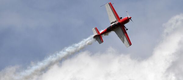 Самолет Су-29 в небе во время соревнований III чемпионата России по самолетному спорту в дисциплине Авиагонки - Формула-1 в подмосковном Серпухове - Sputnik Узбекистан