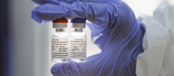 Первая в мире вакцина от коронавируса - Sputnik Узбекистан
