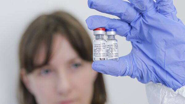 Первая в мире вакцина от коронавируса - Sputnik Ўзбекистон