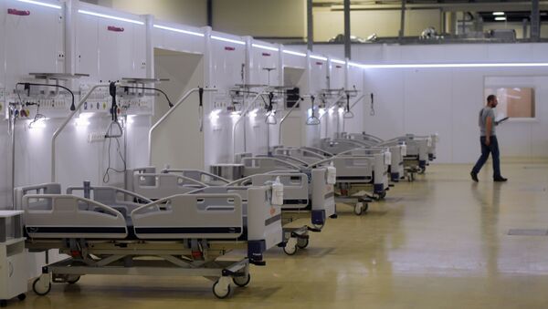 Реанимационное отделение во временном госпитале для пациентов с COVID-19 - Sputnik Узбекистан