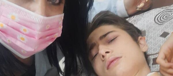 Сардор Камилов и его мать Феруза Турдиева Сардор Камилов и его мать Феруза Турдиева - Sputnik Ўзбекистон