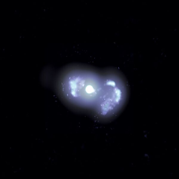 Многочастотное составное изображение галактики TXS 0128+554, находящейся на расстоянии 500 миллионов световых лет от Земли, полученное Национальной радиоастрономической обсерваторией США - Sputnik Узбекистан
