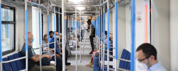 Пассажиры в поезде Пассажиры в поезде - Sputnik Ўзбекистон