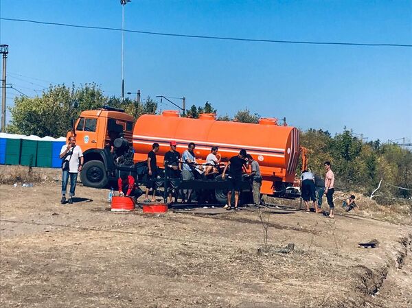 С Лихой домой без лиха: как узбекистанцы в России ждут поезда на родину С Лихой домой без лиха: как узбекистанцы в России ждут поезда на родину - Sputnik Узбекистан