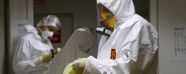 Медицинские работники в госпитале COVID-19 Медицинские работники в госпитале COVID-19 - Sputnik Узбекистан