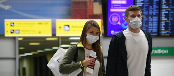 Passajiri v mejdunarodnom aeroportu Sheremetyevo v Moskve - Sputnik O‘zbekiston