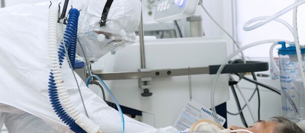 Медицинский работник и пациент  Медицинский работник и пациент  - Sputnik Ўзбекистон