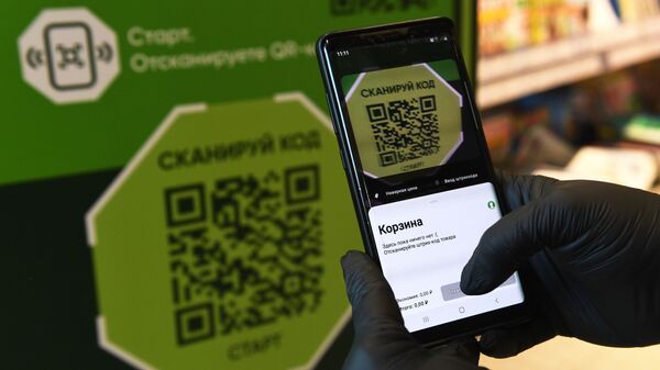 Pokupka s ispolzovaniyem smartfona s pomoshyu beskontaktnoy sistemi - Sputnik O‘zbekiston