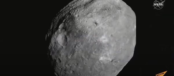 Зонд NASA взял образцы грунта и пыли с поверхности астероида Бенну - Sputnik Узбекистан