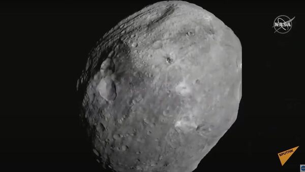Зонд NASA взял образцы грунта и пыли с поверхности астероида Бенну - Sputnik Узбекистан