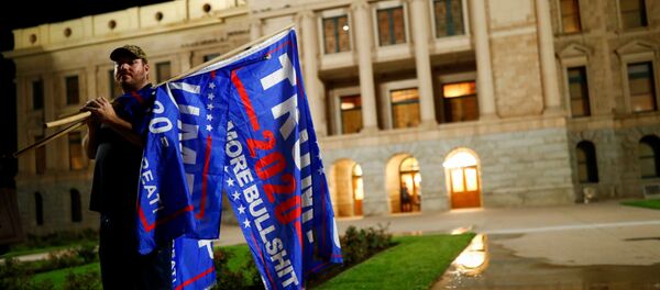 Сторонник президента США Дональда Трампа  - Sputnik Узбекистан