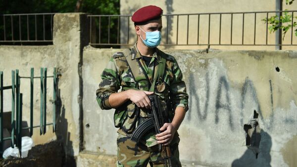  Военнослужащий на одной из улиц Дамаска - Sputnik Узбекистан