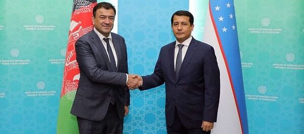 Первый заместитель Министра иностранных дел Республики Узбекистан Фарход Арзиев встретился с главой Администрации Президента Исламской Республики Афганистан Мохаммадом Шокиром Коргаром - Sputnik Узбекистан