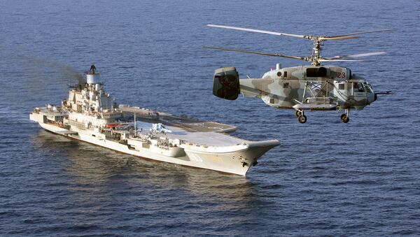Tajeliy avianesushiy kreyser Admiral Kuznetsov i vertolet Ka-29 Voorujennix sil RF v Sredizemnom more - Sputnik O‘zbekiston