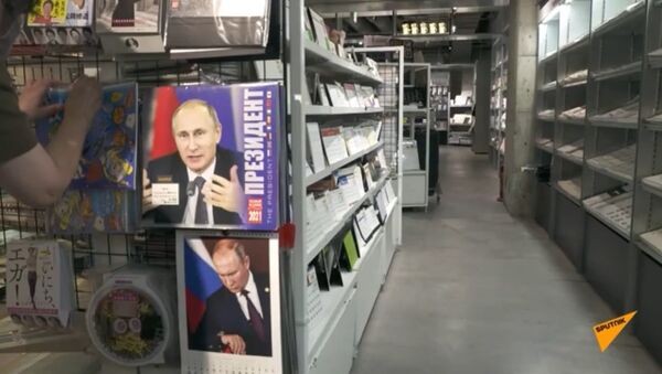 Календари с изображением Путина: хит продаж в Японии 5 лет подряд - Sputnik Узбекистан