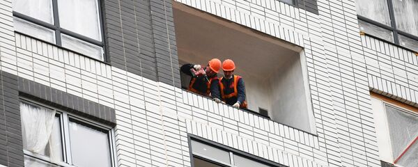 Рабочие на строительной площадке - Sputnik Ўзбекистон