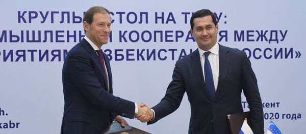 Глава Минпромторга РФ Денис Мантуров и министр внешней торговли Узбекистана Сардор Умурзаков - Sputnik Узбекистан