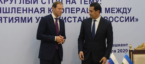 Глава Минпромторга РФ Денис Мантуров и министр внешней торговли РУз Сардор Умурзаков - Sputnik Узбекистан