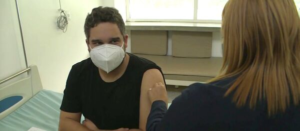 Испытания вакцины Спутник V в Венесуэле: сын Мадуро стал добровольцем Испытания вакцины Спутник V в Венесуэле: сын Мадуро стал добровольцем - Sputnik Ўзбекистон