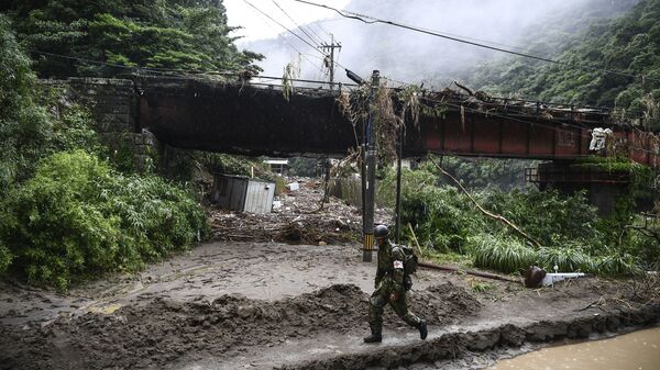 Последствия проливных дождей, разрушительных наводнений и оползней, в результате которых погибло не менее 52 человек, в японской префектуре Кумамото - Sputnik Ўзбекистон