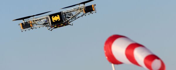 Демонстрационные полеты универсальной авиагрузовой платформы SKYF на аэродроме Демонстрационные полеты универсальной авиагрузовой платформы SKYF на аэродроме - Sputnik Ўзбекистон