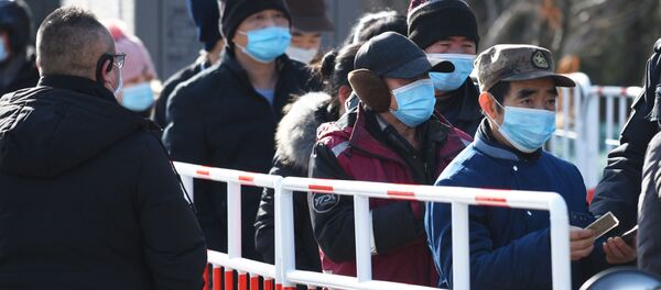 Массовое тестирование на COVID-19 в Китае - Sputnik Узбекистан