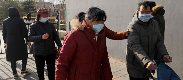 Люди в масках на улице Пекина - Sputnik Узбекистан