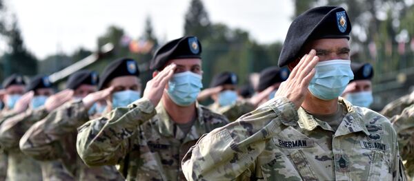 Военнослужащие США на церемонии открытия совместных военных учений Украины и стран НАТО Rapid Trident-2020 на Яворовском полигоне во Львовской области - Sputnik Узбекистан