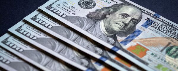 Купюры американских долларов - Sputnik Узбекистан