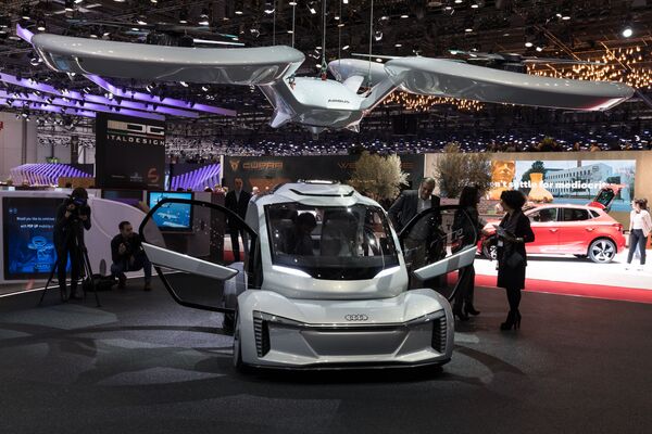 Концептуальный беспилотный летающий электромобиль компаний Audi AG, Airbus и ItalDesign Giugiaro. - Sputnik Узбекистан