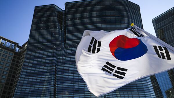 Флаг Южной Кореи в Сеуле. - Sputnik Ўзбекистон