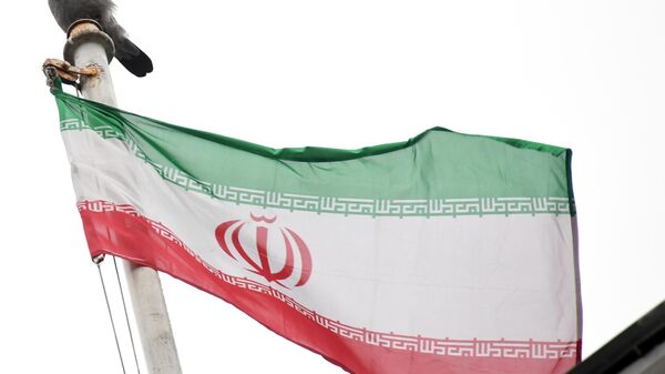 Флаг посольства Исламской Республики Иран на Покровском бульваре в Москве. - Sputnik Узбекистан