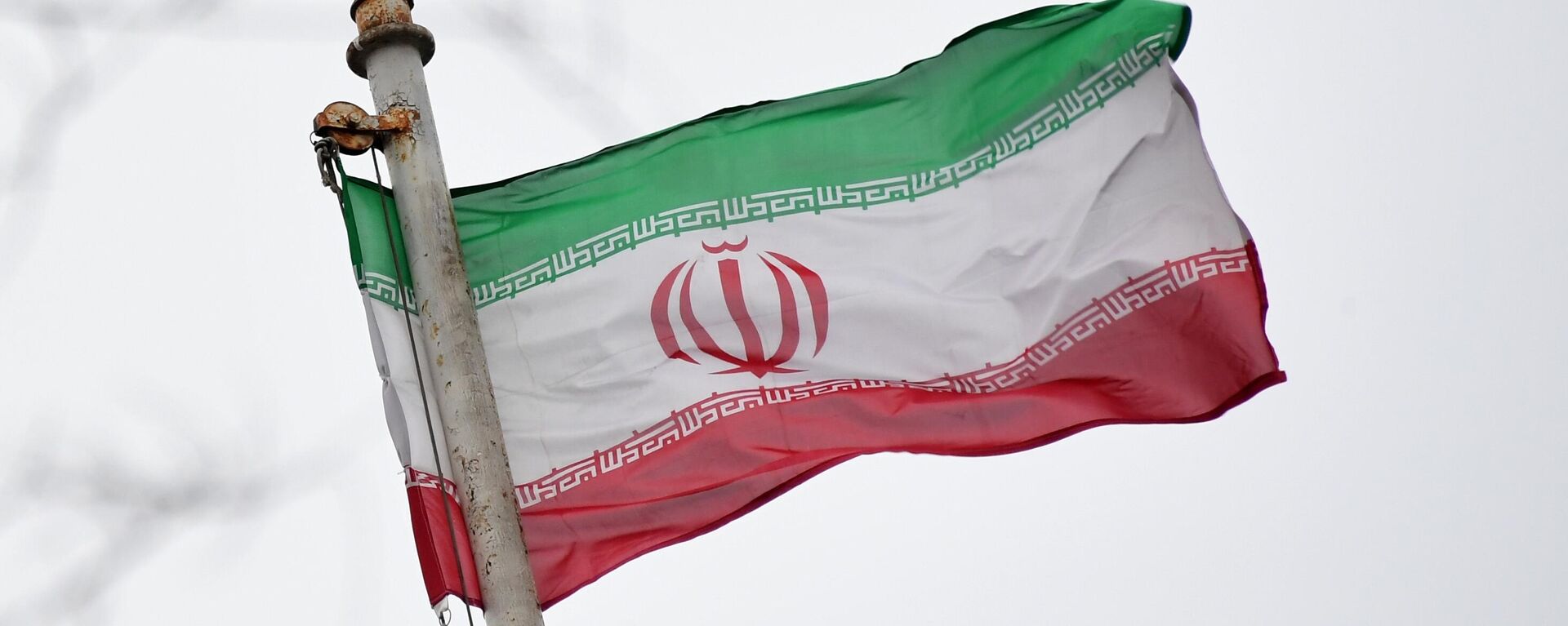 Флаг посольства Исламской Республики Иран на Покровском бульваре в Москве. - Sputnik Узбекистан, 1920, 30.03.2021