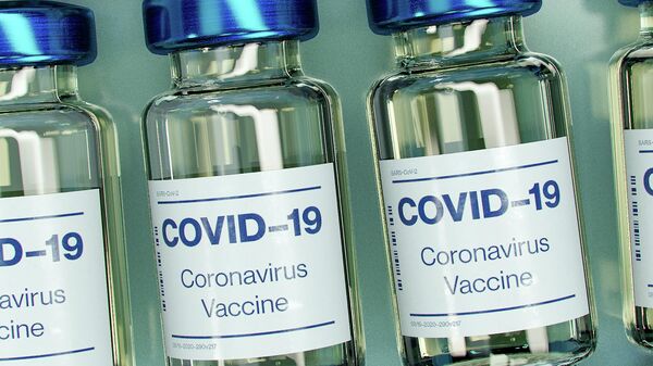 Бутылочки с вакциной от коронавируса. Иллюстративное фото - Sputnik Ўзбекистон