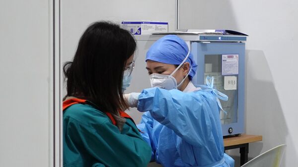 Вакцинация от коронавируса в Пекине - Sputnik Узбекистан