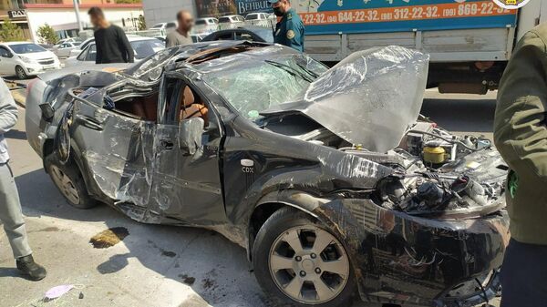 Разбитый автомобиль Chevrolet Lacetti - Sputnik Узбекистан