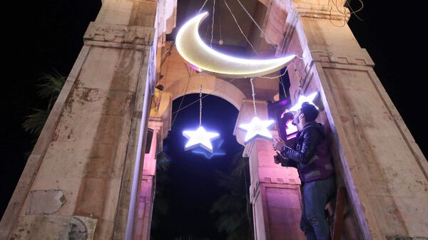 Декорации в честь начала священного месяца Рамадан в Сирии   - Sputnik Ўзбекистон