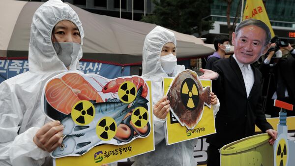Протест против сброса воды с АЭС Фукусима-1 в океан в Сеуле, Южная Корея - Sputnik Узбекистан