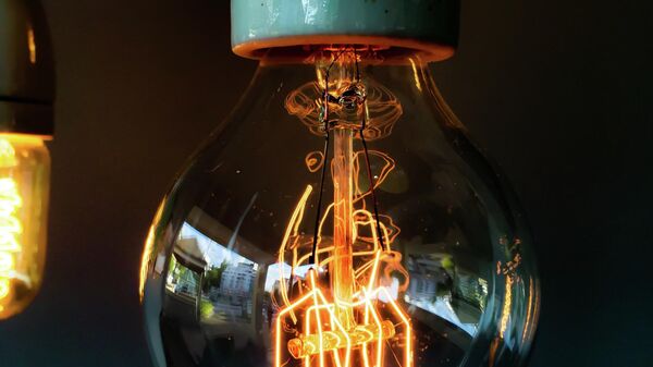 Лампочка, иллюстративное фото - Sputnik Ўзбекистон