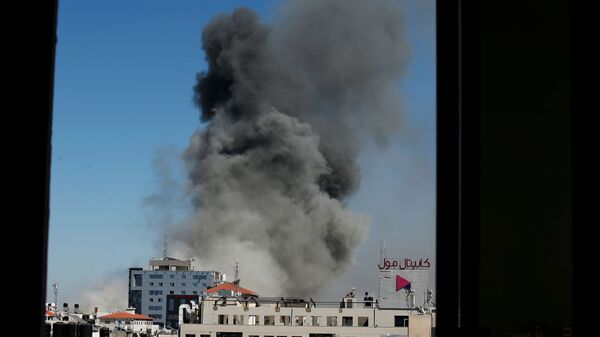 VVS Izrailya unichtojili visotku v Gaze, v kotoroy naxodilis ofisi amerikanskogo informagentstva Associated Press i katarskogo telekanala Al Jazeera - Sputnik O‘zbekiston