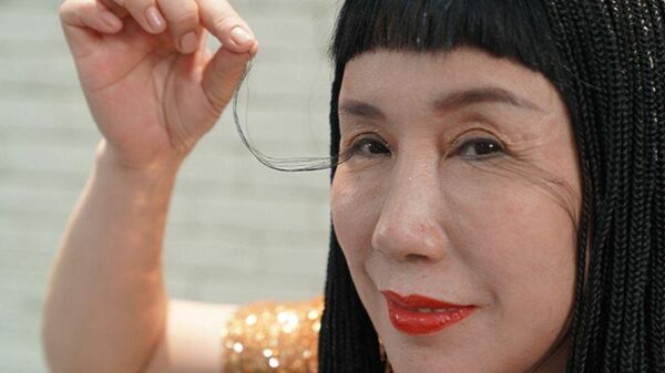 Китаянка Ю Цзянься стала рекордсменкой Книги Гиннесса по длине ресниц - Sputnik Ўзбекистон