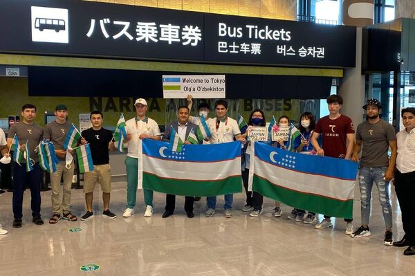 Делегация Узбекистана прибыла в Токио, чтобы принять участие в XXXII летних Олимпийских играх - Sputnik Узбекистан