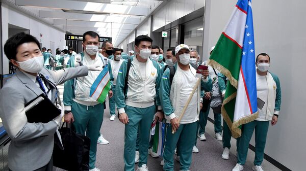 Делегация Узбекистана прибыла в Токио, чтобы принять участие в XXXII летних Олимпийских играх - Sputnik Узбекистан