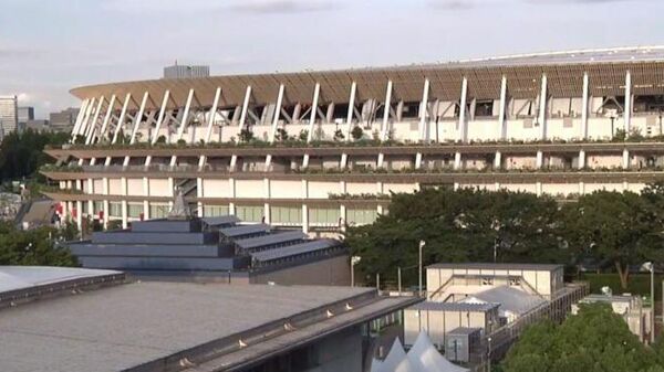 Вид на стадион Токио во время старта Олимпийских игр - Sputnik Узбекистан