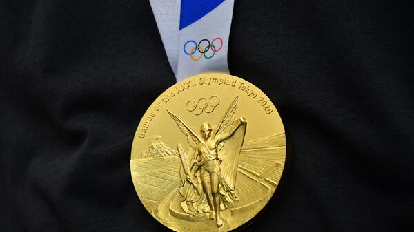Золотая медаль на XXXII летних Олимпийских играх в Токио, - Sputnik Ўзбекистон