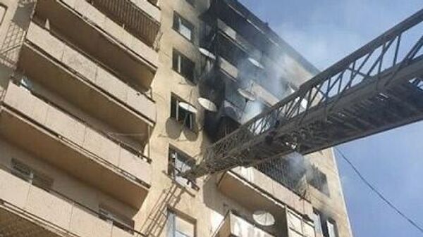 Пожар в многоэтажном здании в Ангрене - Sputnik Узбекистан
