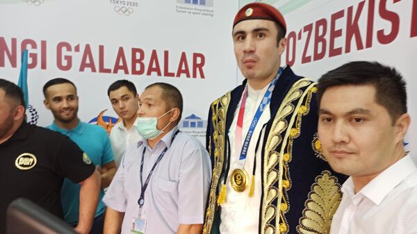 Встреча олимпийской сборной Узбекистана в аэропорту Ташкента - Sputnik Узбекистан
